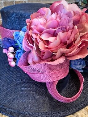 Elegant Navy Straw Hat with Pink Flower Accent
